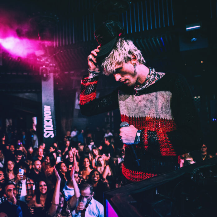 MGK performing at AUDACIOUS Launch Party
