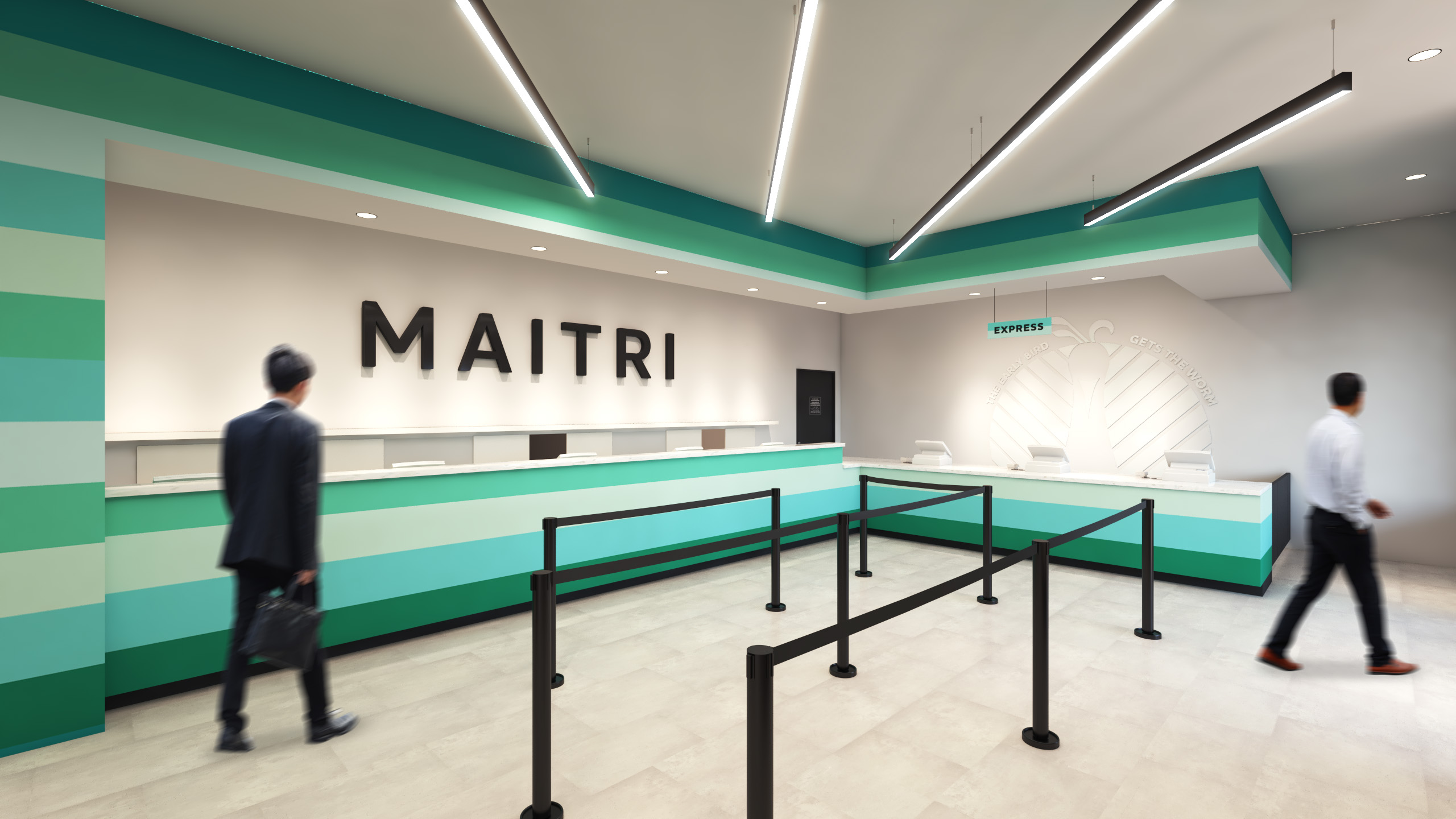 inside of dispensary with maitri logo in black on a white wall with blue counters